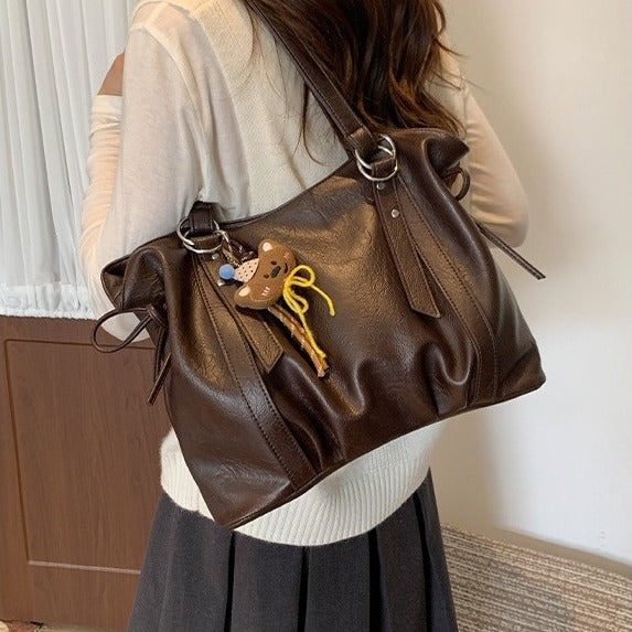 VILZSTUDIOS soft faux leather slouchy tote bag with embroidery charm