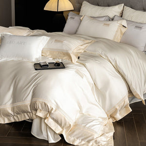 VILZSTUDIOS Blush pink, ivory cream and light gray satin bedding set with eyelet lace borders and embroidered crests