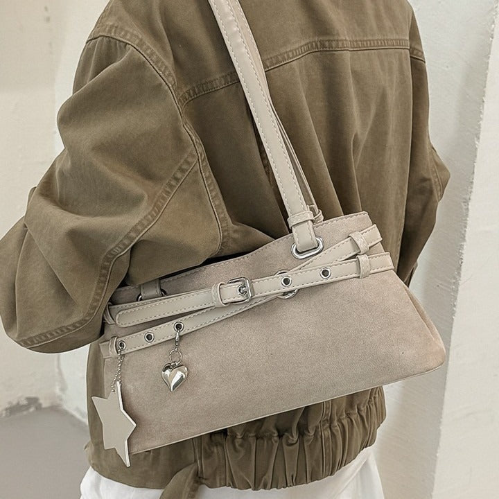 VILZSTUDIOS faux suede shoulder bag with heart charm