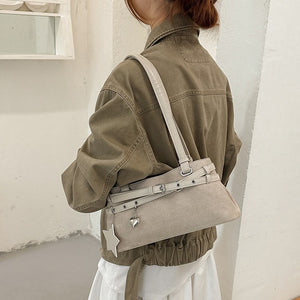 VILZSTUDIOS faux suede shoulder bag with heart charm