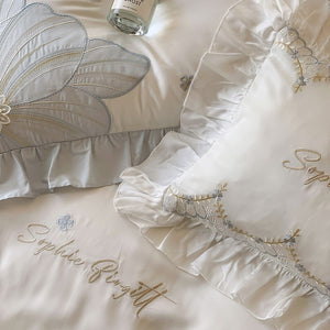 VILZSTUDIOS pastel blue or blush pink and cream floral appliqué bedding set with ruffled borders