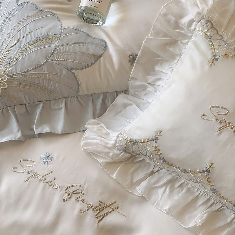 VILZSTUDIOS pastel blue or blush pink and cream floral appliqué bedding set with ruffled borders