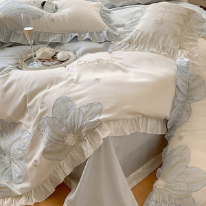 VILZSTUDIOS pastel blue or blush pink and cream floral appliqué bedding set with ruffled borders