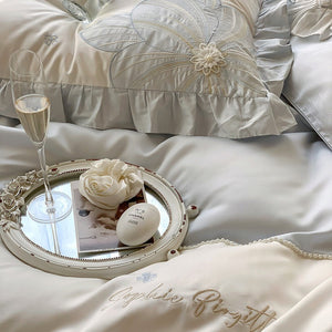 VILZSTUDIOS pastel blue or blush pink and cream floral appliqué bedding set with ruffled borders