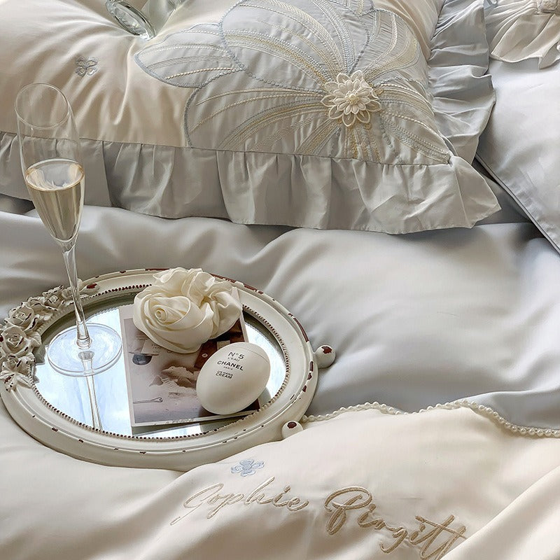 VILZSTUDIOS pastel blue or blush pink and cream floral appliqué bedding set with ruffled borders