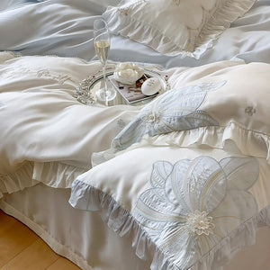 VILZSTUDIOS pastel blue or blush pink and cream floral appliqué bedding set with ruffled borders