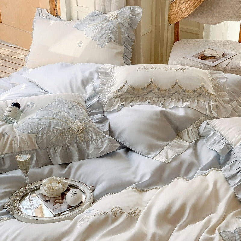 VILZSTUDIOS pastel blue or blush pink and cream floral appliqué bedding set with ruffled borders