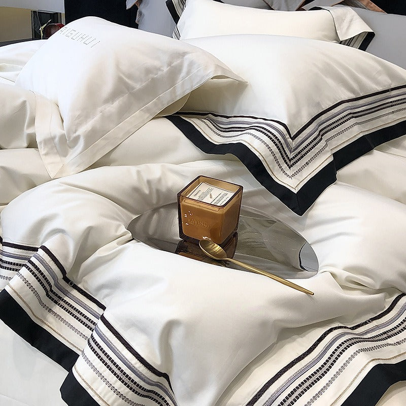 VILZSTUDIOS Solid-color cotton bedding set with geometric embroidered borders and contrasting piped edges