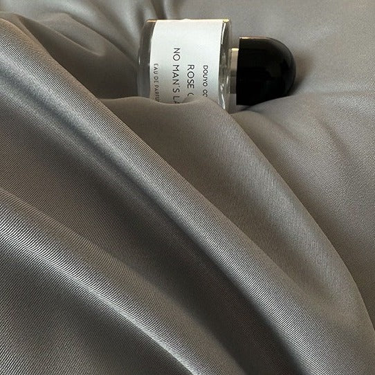VILZSTUDIOS solid and two-tone pastel satin bedding set with a glossy finish
