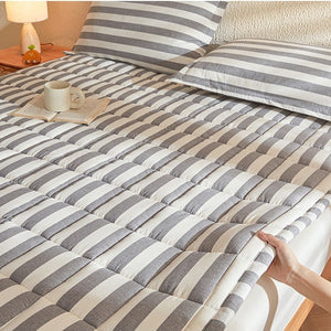 VILZSTUDIOS gray striped mattress pad with rectangular grid quilting and bound edges
