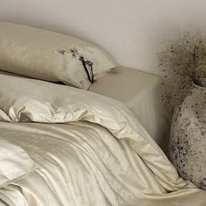 VILZSTUDIOS pale champagne botanical jacquard duvet cover set with embroidered branches and dark green pillowcase bows
