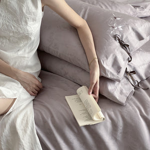 VILZSTUDIOS pale champagne botanical jacquard duvet cover set with embroidered branches and dark green pillowcase bows