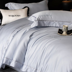 VILZSTUDIOS solid-color satin duvet cover set with wide flanged borders and delicate hemstitch trim