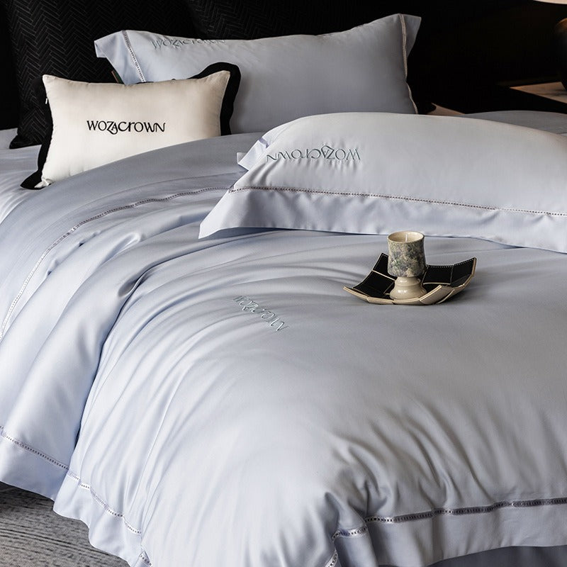 VILZSTUDIOS solid-color satin duvet cover set with wide flanged borders and delicate hemstitch trim