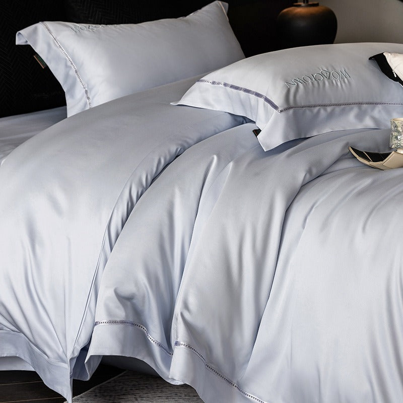 VILZSTUDIOS solid-color satin duvet cover set with wide flanged borders and delicate hemstitch trim