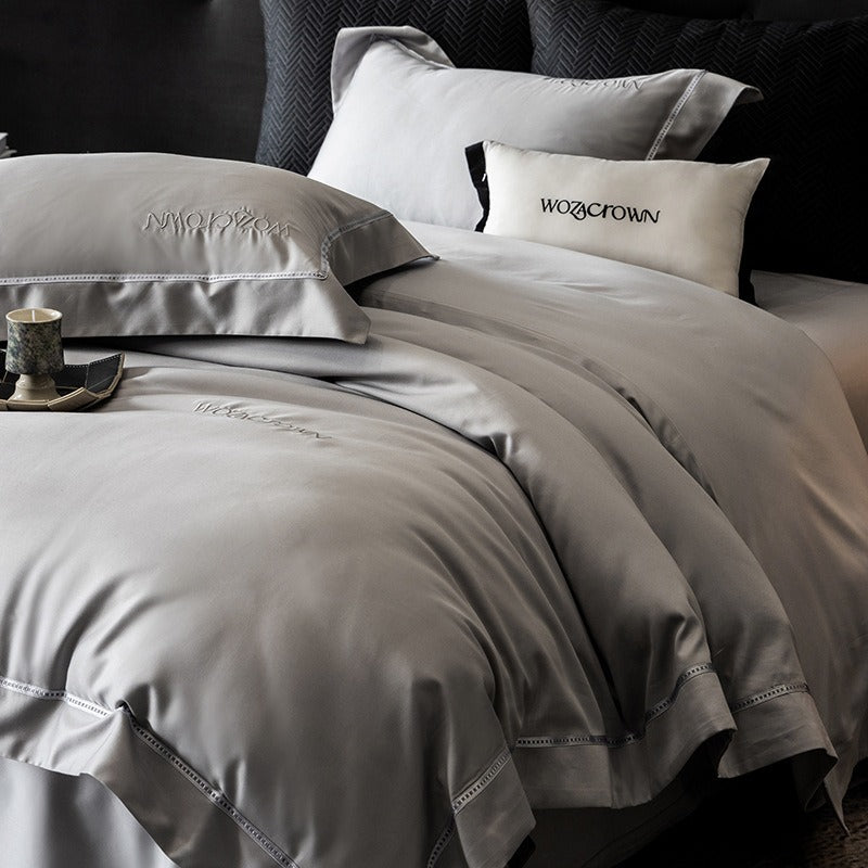 VILZSTUDIOS solid-color satin duvet cover set with wide flanged borders and delicate hemstitch trim