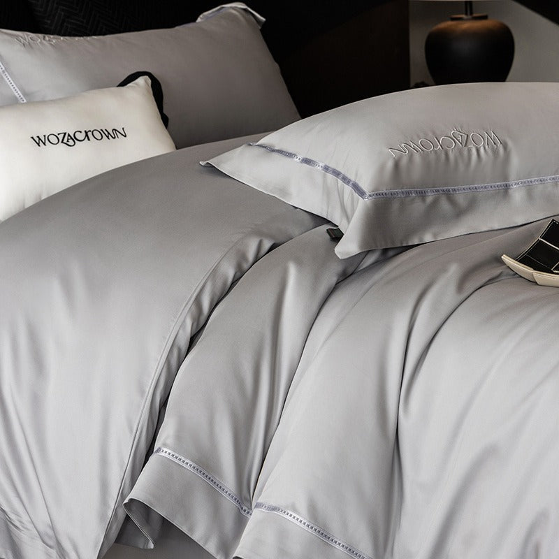 VILZSTUDIOS solid-color satin duvet cover set with wide flanged borders and delicate hemstitch trim