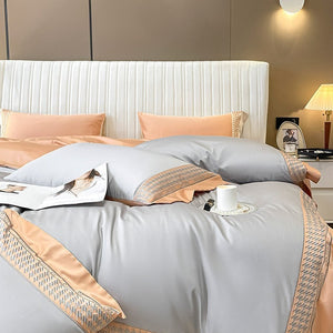 VILZSTUDIOS peach and cream satin duvet cover set with textured houndstooth borders and wide flanged edges