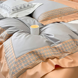 VILZSTUDIOS peach and cream satin duvet cover set with textured houndstooth borders and wide flanged edges