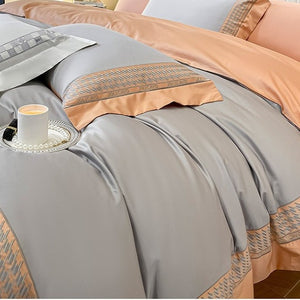 VILZSTUDIOS peach and cream satin duvet cover set with textured houndstooth borders and wide flanged edges