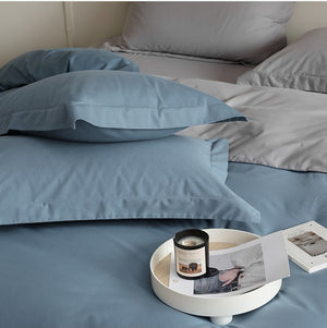 VILZSTUDIOS muted two-tone duvet cover set with contrasting reverse and flanged pillowcases