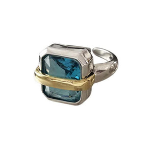 VILZSTUDIOS Stylish ring featuring a blue gemstone with silver and gold accents