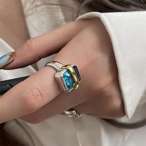VILZSTUDIOS Stylish ring featuring a blue gemstone with silver and gold accents