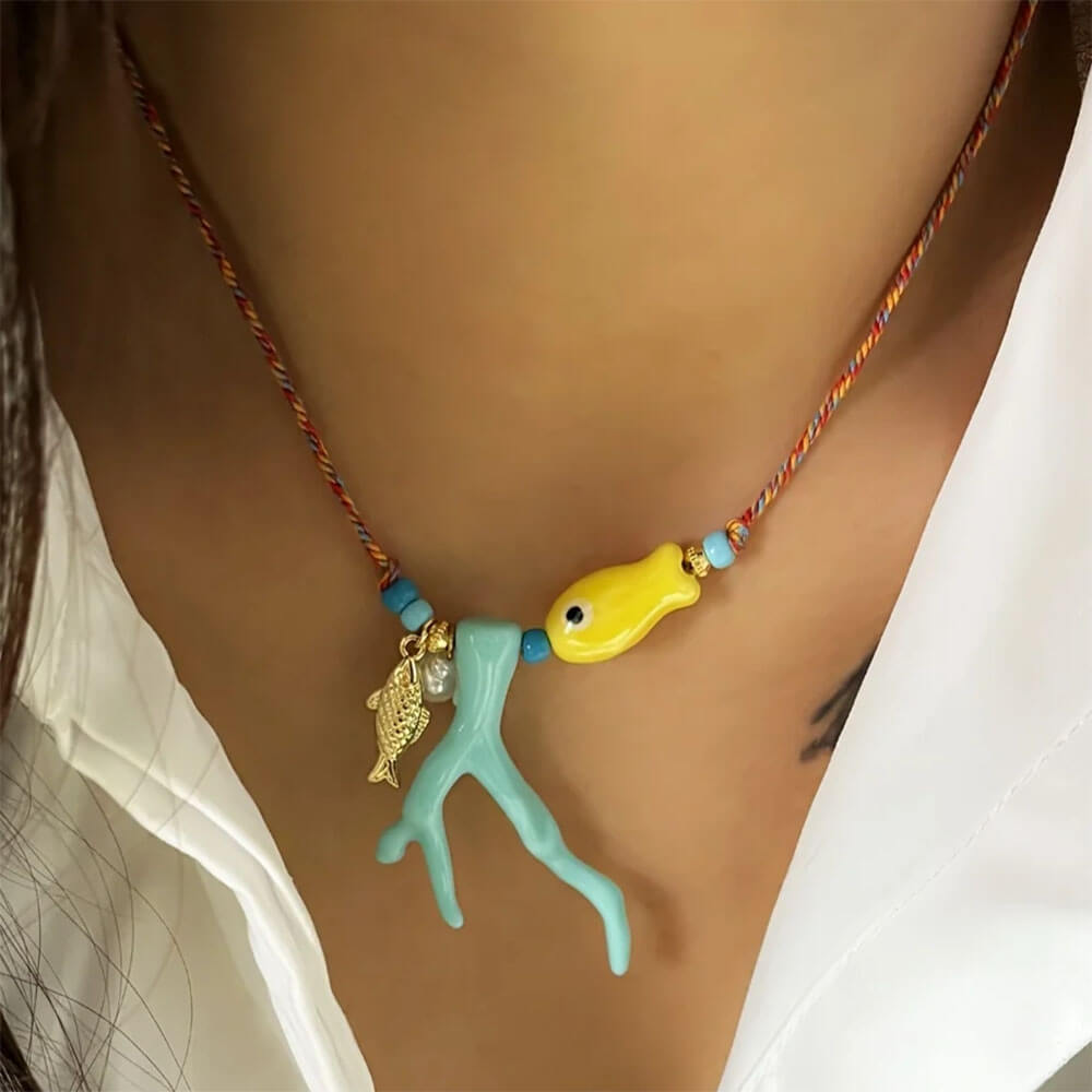 VILZSTUDIOS Ocean-inspired necklace with fish charm and coral pendant