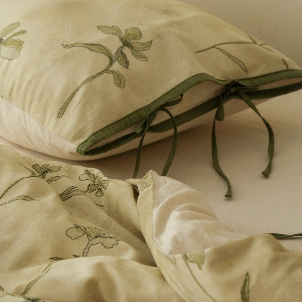 VILZSTUDIOS cream-yellow botanical duvet cover set with olive floral stems and ribbon-tie pillowcases