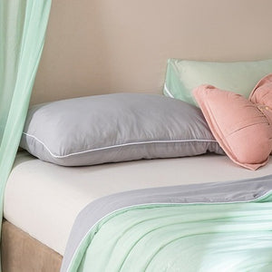 VILZSTUDIOS pastel two-tone summer quilt with circular quilting and piped edges
