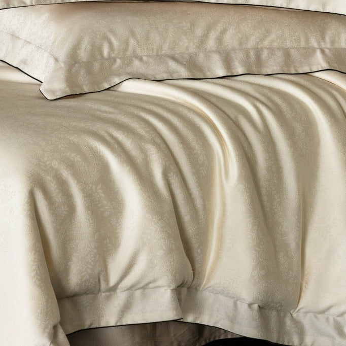 VILZSTUDIOS neutral satin jacquard duvet cover set with wide pillowcase borders and dark contrast piping