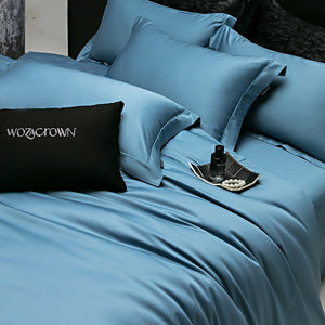 VILZSTUDIOS muted solid-color satin duvet cover set with piped borders and flanged pillowcases