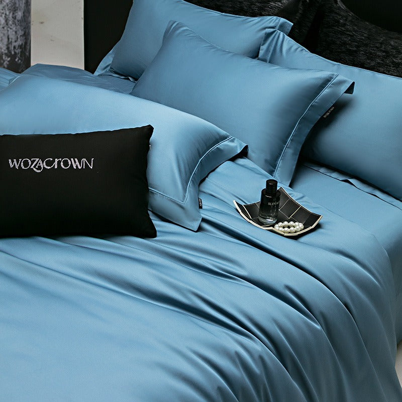 VILZSTUDIOS muted solid-color satin duvet cover set with piped borders and flanged pillowcases
