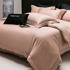 VILZSTUDIOS muted solid-color satin duvet cover set with piped borders and flanged pillowcases