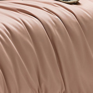 VILZSTUDIOS muted solid-color satin duvet cover set with piped borders and flanged pillowcases