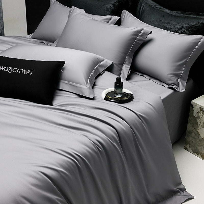 VILZSTUDIOS muted solid-color satin duvet cover set with piped borders and flanged pillowcases