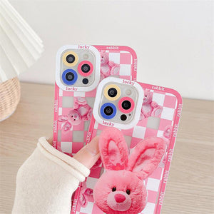VILZSTUDIOS Checkered phone case featuring a bunny design