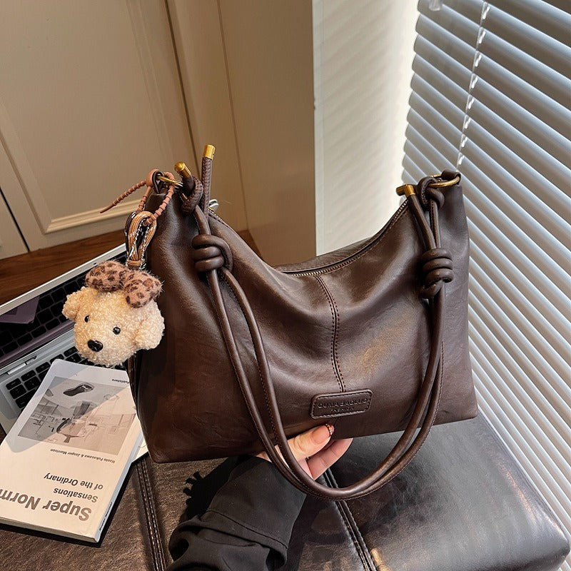 VILZSTUDIOS slouchy shoulder bag with plush bear charm