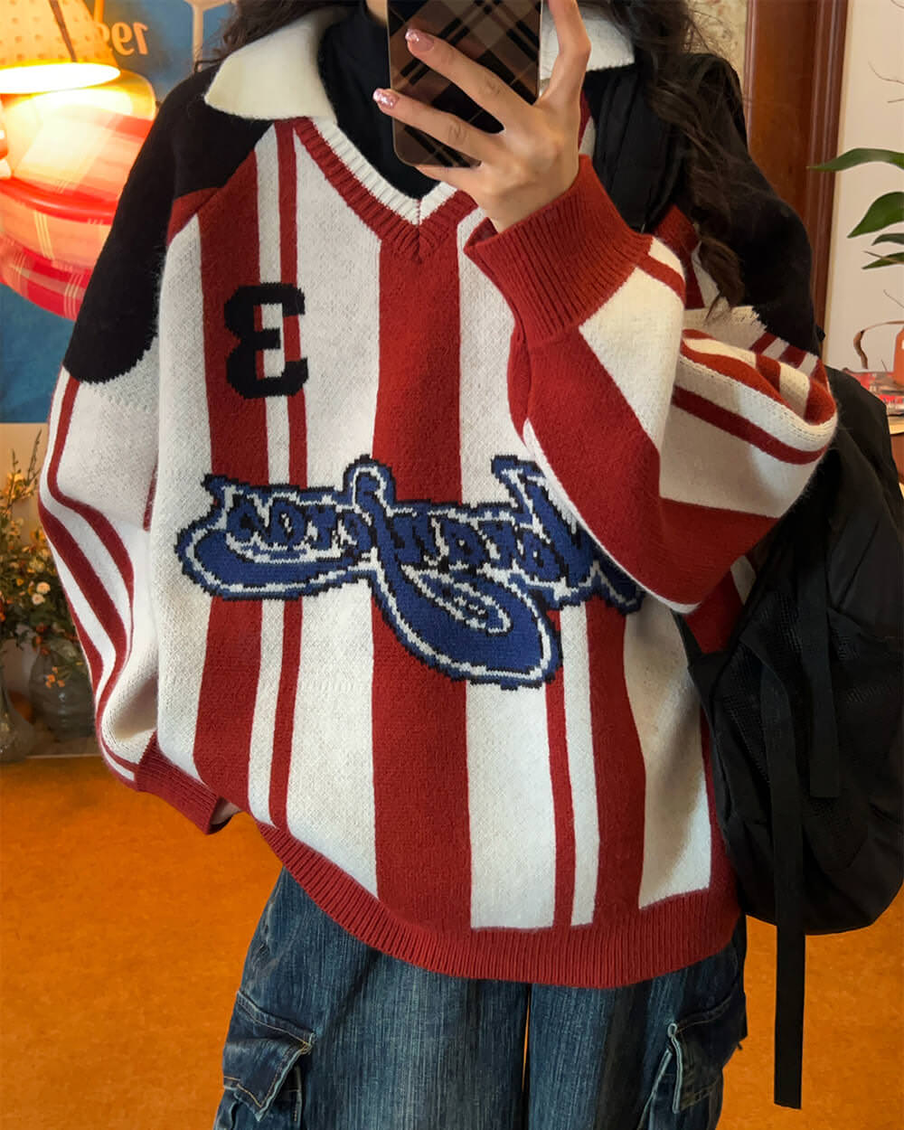 VILZSTUDIOS Retro varsity style knit sweater with stripes and patch