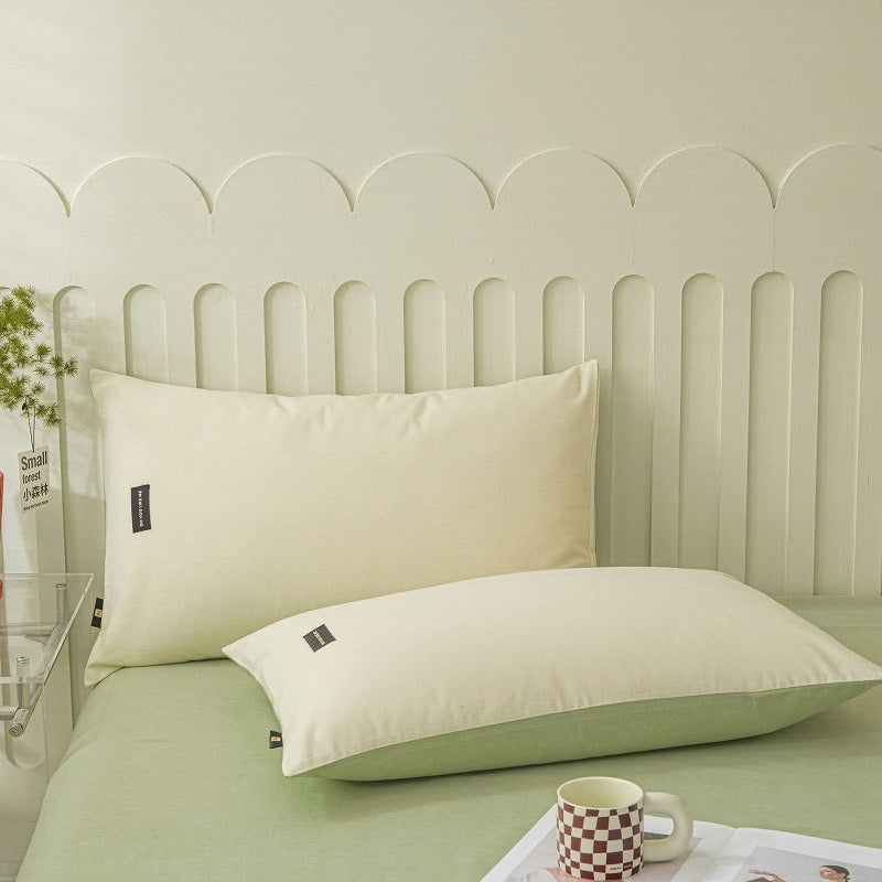 VILZSTUDIOS pastel and warm neutral reversible bedding set with small rectangular woven accent patches