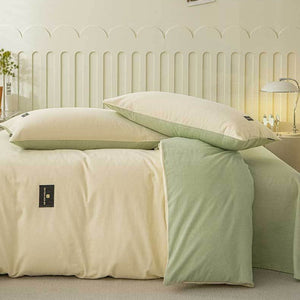 VILZSTUDIOS pastel and warm neutral reversible bedding set with small rectangular woven accent patches