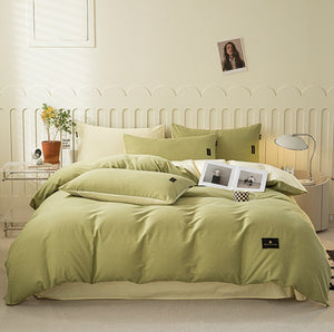 VILZSTUDIOS pastel and warm neutral reversible bedding set with small rectangular woven accent patches