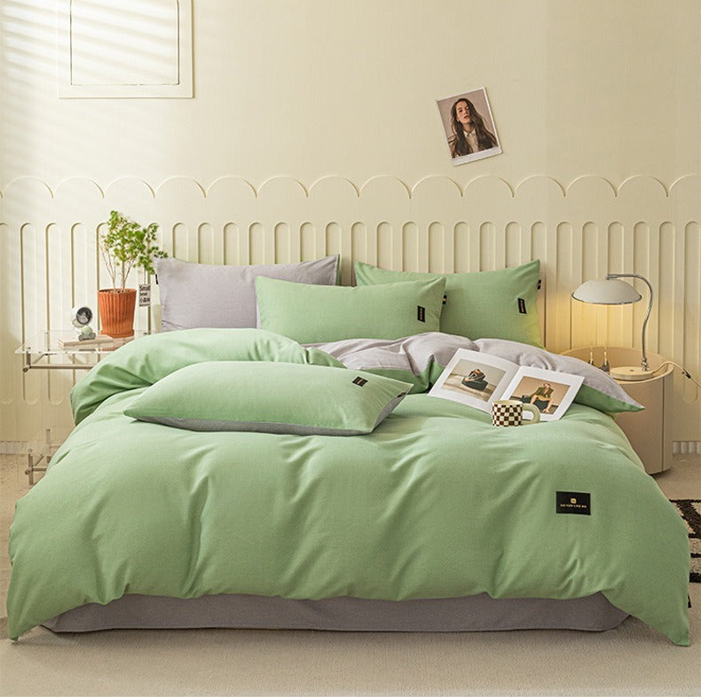 VILZSTUDIOS pastel and warm neutral reversible bedding set with small rectangular woven accent patches