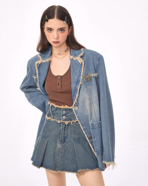 VILZSTUDIOS Ripped denim blazer with butterfly pin and frayed edges