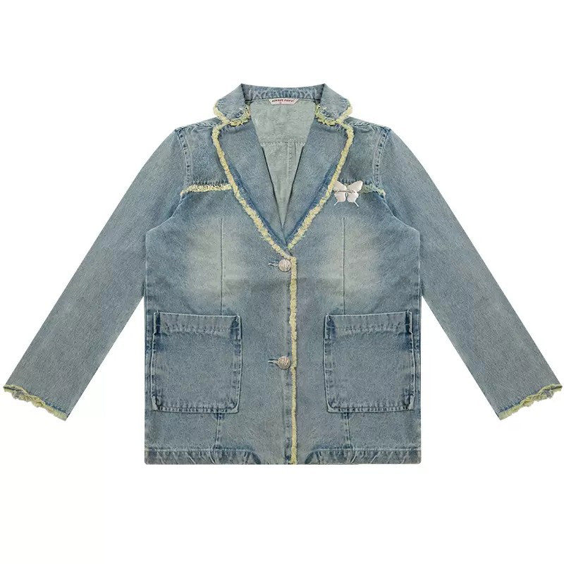 VILZSTUDIOS Ripped denim blazer with butterfly pin and frayed edges