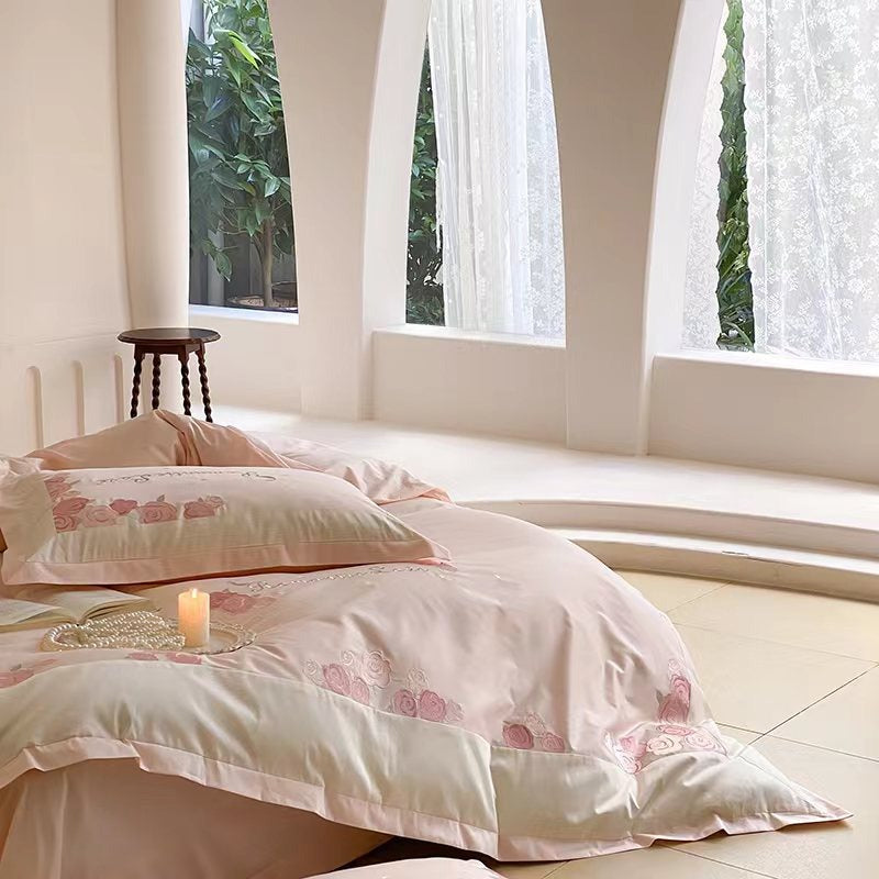 VILZSTUDIOS blush pink satin bedding set with rose and crescent moon embroidery and cream-white borders