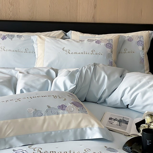 VILZSTUDIOS pastel pink or light blue rose and celestial embroidered bedding set with contrast borders and ruffled edges