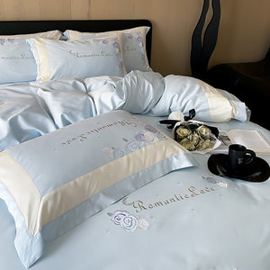VILZSTUDIOS pastel pink or light blue rose and celestial embroidered bedding set with contrast borders and ruffled edges