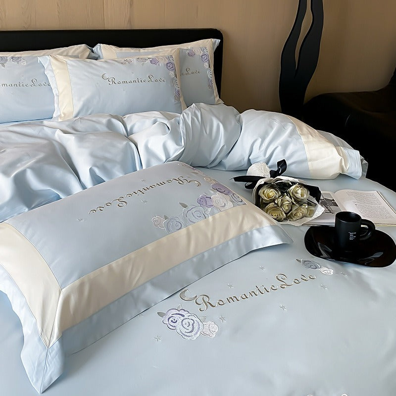 VILZSTUDIOS pastel pink or light blue rose and celestial embroidered bedding set with contrast borders and ruffled edges