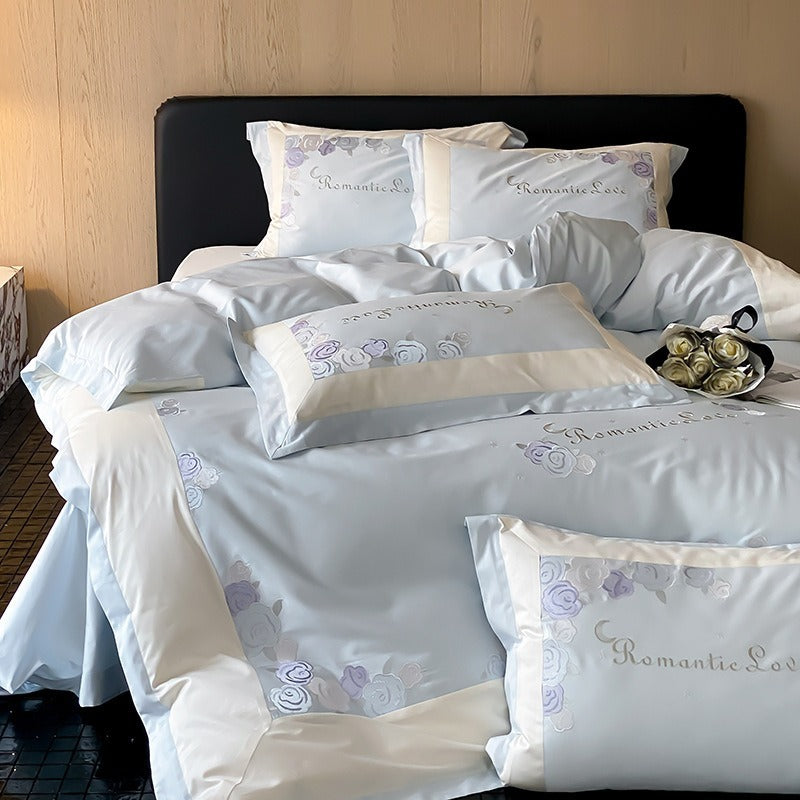 VILZSTUDIOS pastel pink or light blue rose and celestial embroidered bedding set with contrast borders and ruffled edges
